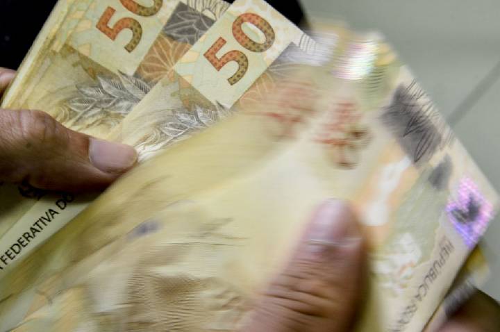 Caixa começa a pagar Bolsa Família de maio